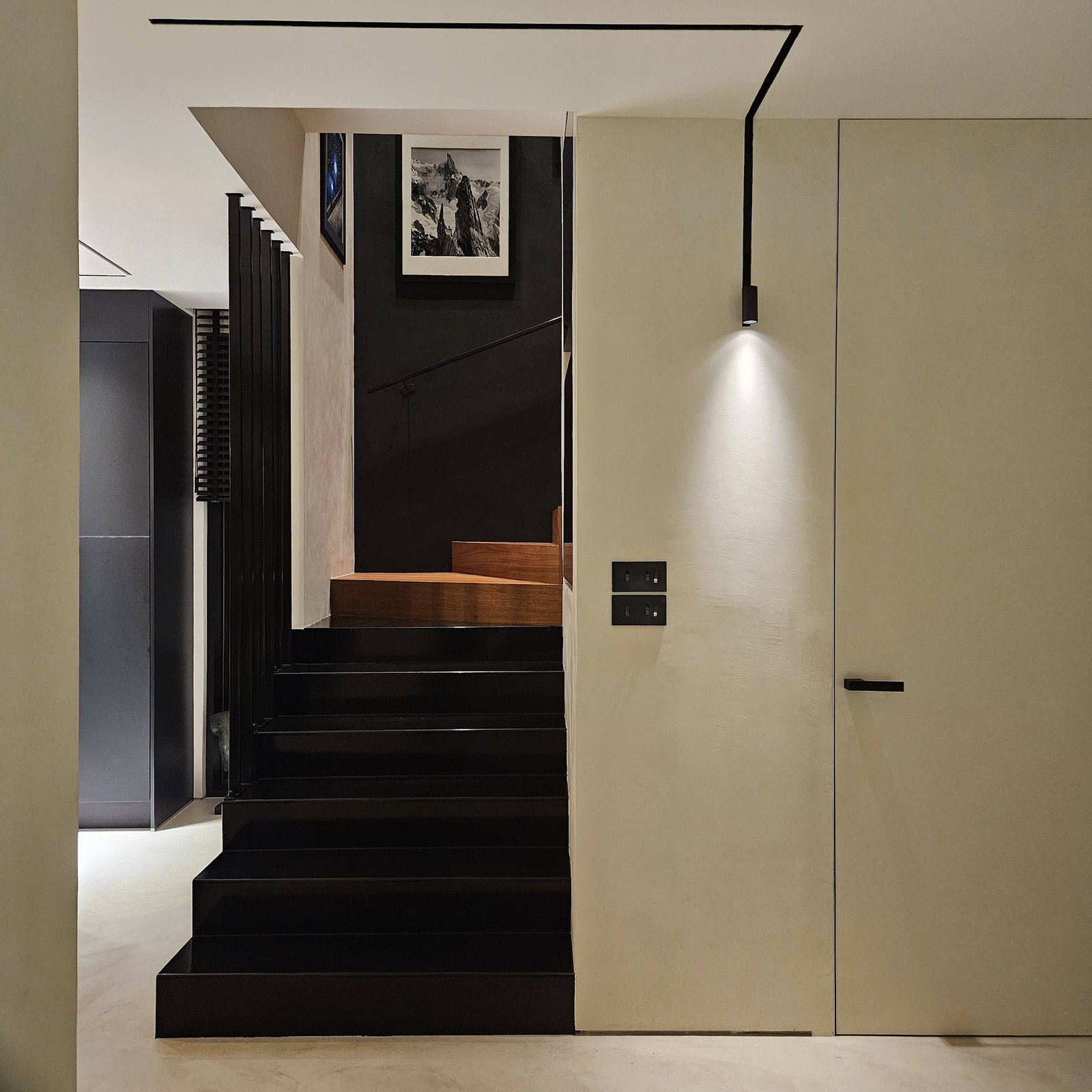 Staircase with concealed track lighting