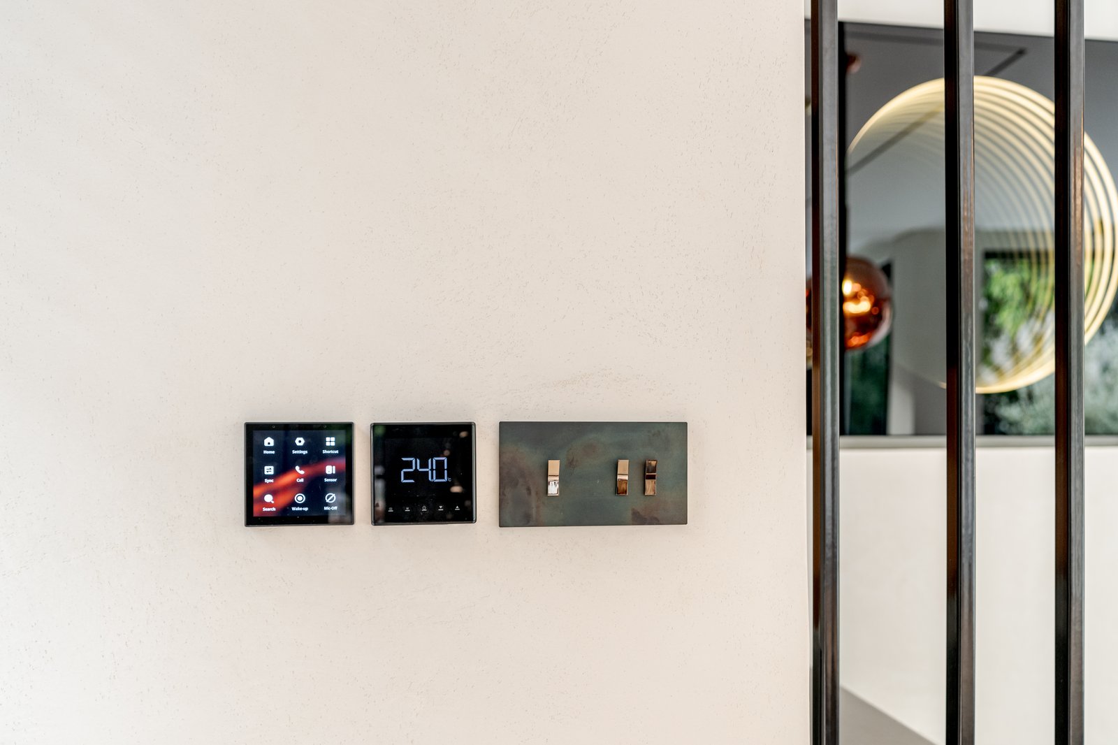 Wall-mounted control panel and switch detail